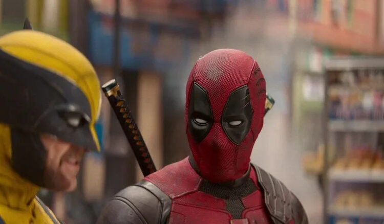 Deadpool looking at Wolverine in Deadpool & Wolverine