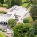 Aerial view of Royal Lodge, Windsor, showing the expansive 30-room mansion and surrounding grounds.