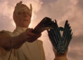 A Martian holding a Martian device in The Martian Chronicles