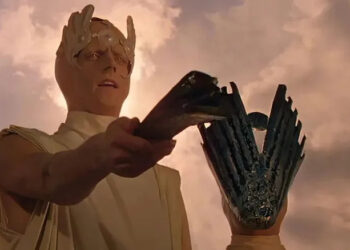 A Martian holding a Martian device in The Martian Chronicles