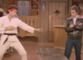 Henry Winkler as Arthur Fonzarelli stands opposite Tom Hanks as Dr. Dwayne Twitchell in Happy Days