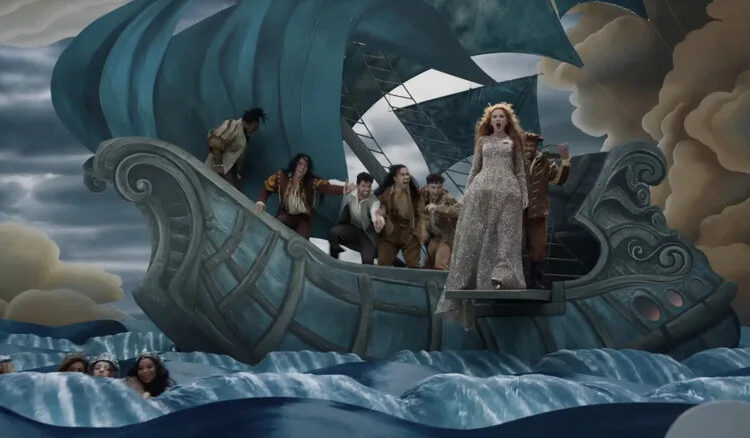 Taylor Swift singing with her backup dancers on a ship during the Fate of Ophelia music video