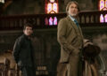 From left to right: Josh O'Connor leaning against a church bench and Daniel Craig holding a coat and hat as Benoit Blanc in Wake Up Dead Man.