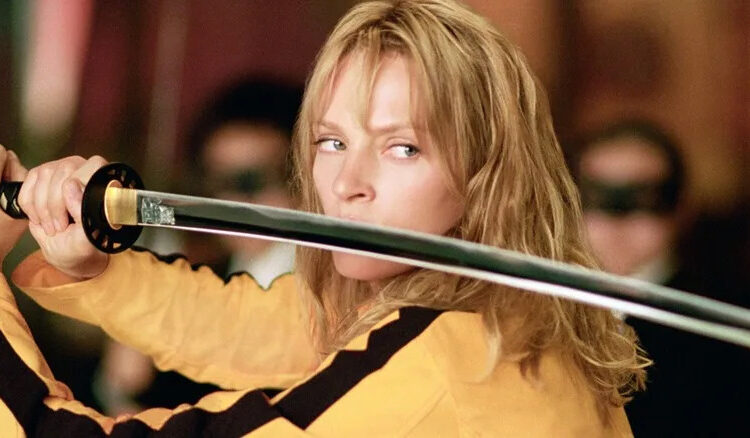 Uma Thurman as Beatrix Kiddo holding sword in Kill Bill Part 1