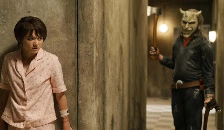 Gwen hiding from the Grabber in Black Phone 2