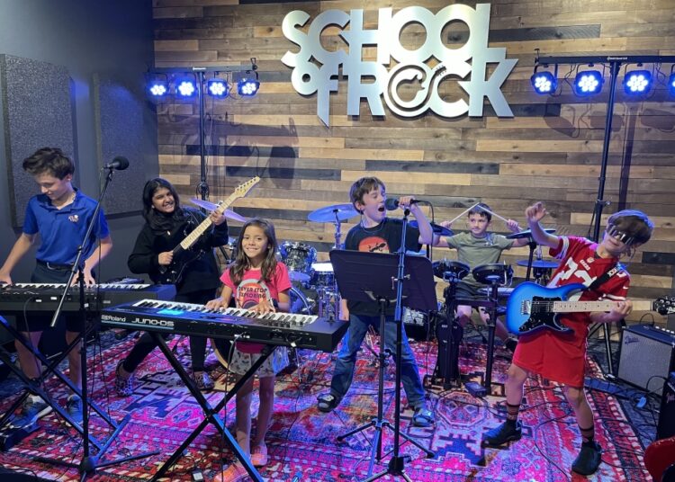 kids play musical instruments in a band