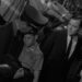 Martin Sloan standing next to a cop holding Martin's younger self in The Twilight Zone