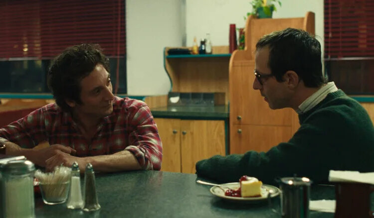 Bruce and Jon sit at a diner counter in Springsteen: Deliver Me From Nowhere