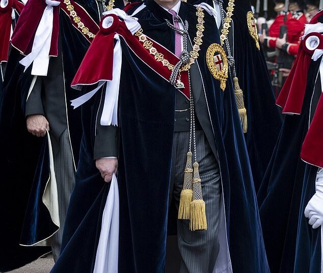 Prince Andrew at the Order of the Garter service in 2019 outside St George's Chapel in Windsor - he will now relinquish his Knight of the Garter status, as well as the title of Duke of York