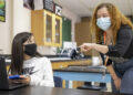 Science teacher Stacey Rivera teaches sixth-grader Joliena Ramirez, 11, at Bedichek Middle School in South Austin. Austin school district Superintendent Stephanie S. Elizalde invited students to return to on-campus classes amid a decrease in coronavirus cases. (JAY JANNER/AMERICAN-STATESMAN)