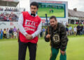 (L to R) Benito Antonio Martínez Ocasio as Oscar Mejias and Adam Sandler as Happy Gilmore in Happy Gilmore 2.