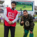 (L to R) Benito Antonio Martínez Ocasio as Oscar Mejias and Adam Sandler as Happy Gilmore in Happy Gilmore 2.