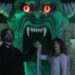 Dr. Mortis and wife in front of Dr. Mortis' House of Horrors home haunt in V/H/S/Halloween.