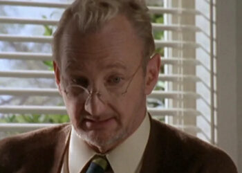 Robert Englund as Mr Bell is seen against a classroom blind in The Nightmare Room