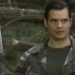 Scooby holding a gun in the woods in Mr. & Mrs. Smith
