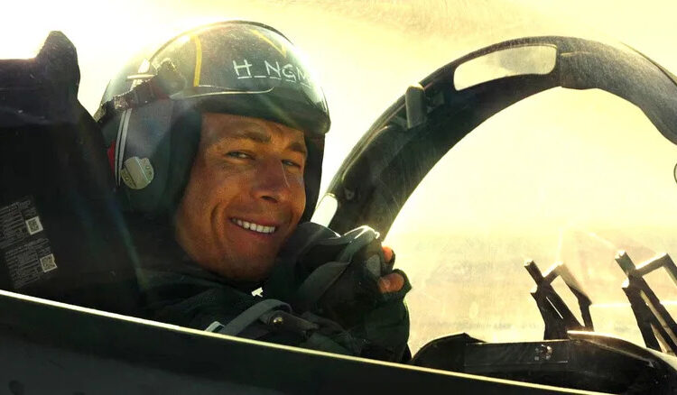Hangman smiling in his cockpit in Top Gun: Maverick