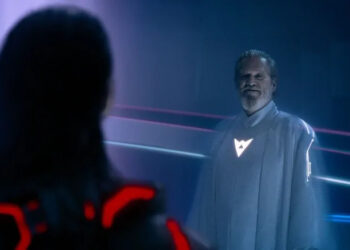 Jeff Bridges as Flynn looking at Jared Leto as Ares in Tron: Ares