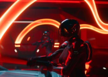 Two people wearing form-fitting full body armor and plastic helmets. The people are waving staffs that leave bands of glowing orange light in their wakes.
