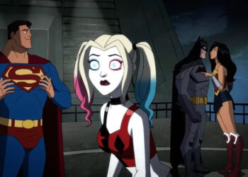 Kaley Cuoco's Harley Quinn standing in front of Superman, Batman, and Wonder Woman in Harley Quinn