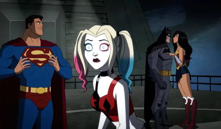 Kaley Cuoco's Harley Quinn standing in front of Superman, Batman, and Wonder Woman in Harley Quinn