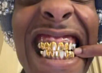 A$AP Rocky showing off gold grills with a close-up smile. Tyler, the Creator is in a small video call window.