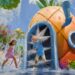 a rendering of kids playing in and around a splash-zone pineapple
