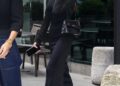 Victoria Beckham ended her colorful streak in an all-black skirt set and a rare Herm&egrave;s Kelly bag