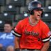 Houston Astros player Walker Janek celebrates in orange college jersey and black helmet.