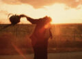Gunnar Hansen's Leatherface dances in the sunset in The Texas Chainsaw Massacre