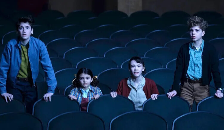 Phil, Susie, Lilly and Teddy have a bad movie theater experience in It: Welcome to Derry