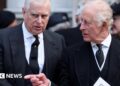 Prince Andrew and King Charles, dressed in black mourning clothes, at the funeral of the Duchess of Kent