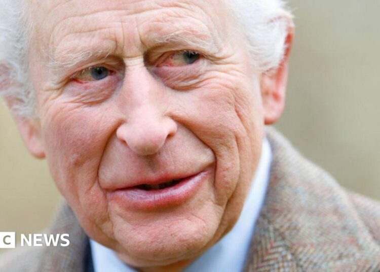 King Charles wears a sandy-coloured overcoat and white shirt while attending a service at the Church of St Mary the Virgin, close to the Sandringham Estate in Norfolk, England, on 26 January, 2025.