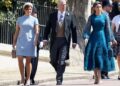 prince andrew with princess eugenie and princess beatrice at the royal wedding