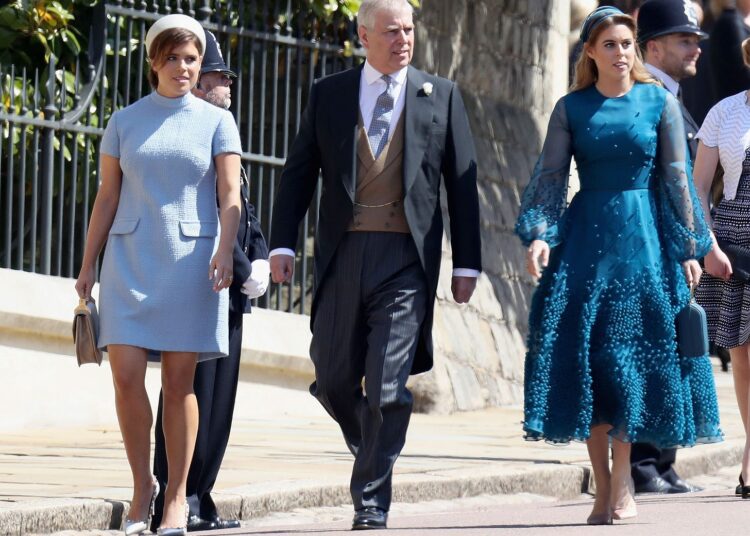 prince andrew with princess eugenie and princess beatrice at the royal wedding