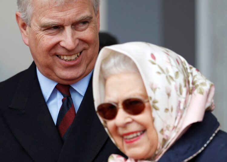 The Queen, in a silk scarf and sunglasses, laughs with Prince Andrew