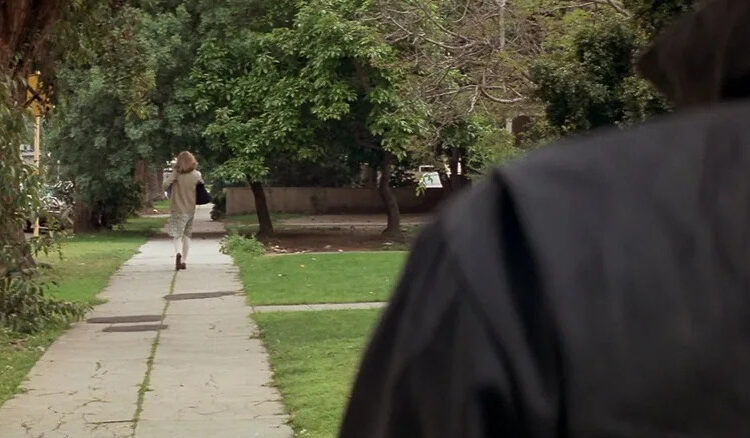 Michael Myers stares down Jamie Lee Curtis as Laurie Strode in Halloween.