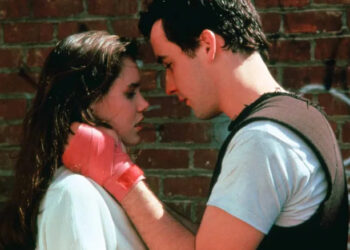 Diane and Lloyd, heads together, him all sweaty, in Say Anything...