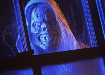 The Creep peeking through a window on Creepshow