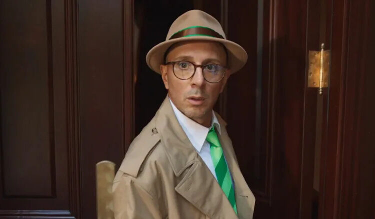 Steve looking shocked in a detective's coat and hat while stepping out of his front door in Blue's Big City Adventure