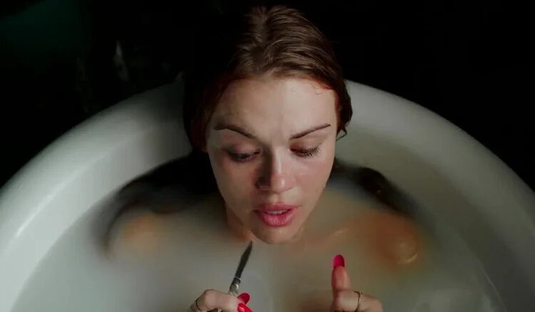 Holland Roden as Zoe Woods in the bathtub with a blade in the Channel Zero episode All You Ghost Mice