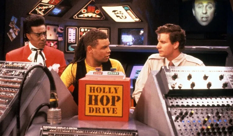 Cat, Dave, and Rimmer engage in conversation in the original run of Red Dwarf