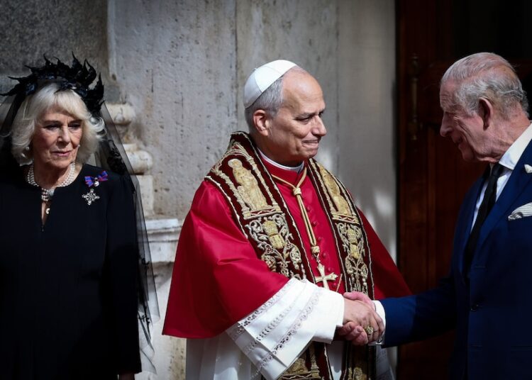 King Charles shakes hands with Pope Leo XIV in the courtyard as Queen Camilla watched on.