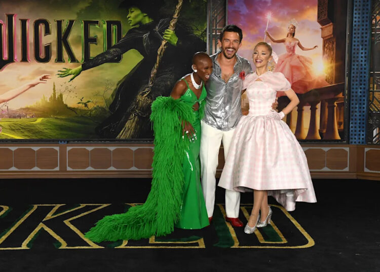 From left to right, Cynthia Erivo, Jonathan Bailey and Ariana Grande attend Universal's "Wicked" premiere at the Dorothy Chandler Pavilion in Los Angeles on Nov. 9, 2024.