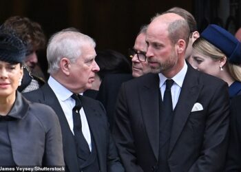 Prince Andrew (pictured left) seen in a frosty exchange with Prince William (pictured right) as they walked out of Westminster Abbey at the Duchess of Kent's funeral last month