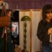 YouTube content creators Diana Extein, left, and Candice Waltrip, right, film clothing try-ons during YouTube's Holiday House shopping event at Google Spruce Goose on Thursday, Oct. 16, 2025 in Playa Vista, CA.