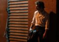 This image released by 20th Century Studios shows Jeremy Allen White as Bruce Springsteen in a scene from "Springsteen: Deliver Me From Nowhere." (Macall Polay/20th Century Studios via AP)