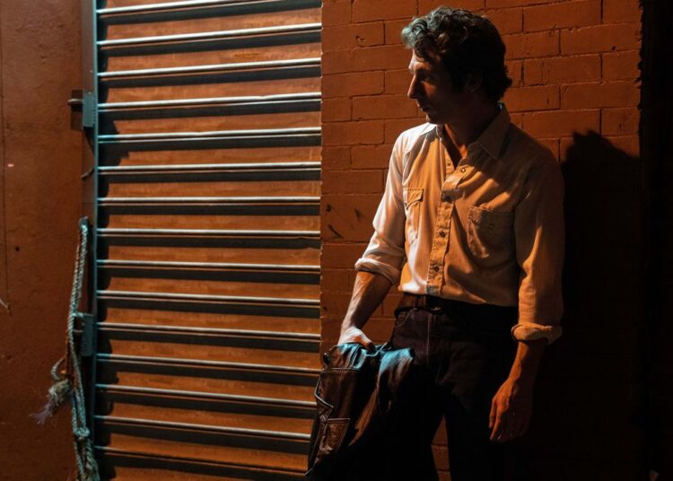 This image released by 20th Century Studios shows Jeremy Allen White as Bruce Springsteen in a scene from "Springsteen: Deliver Me From Nowhere." (Macall Polay/20th Century Studios via AP)