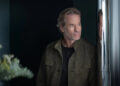 guy pearce as bullmer in the woman in cabin 10. cr. parisa taghizadeh/netflix © 2025