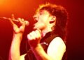 Bono of U2, performing in 1983