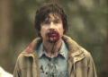 Jason Bateman as Terry Maitland with blood on his face in The Outsider